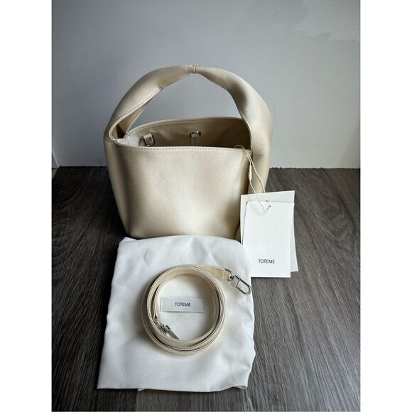 Toteme Petite satin bucket bag $890 - Picture 6 of 12